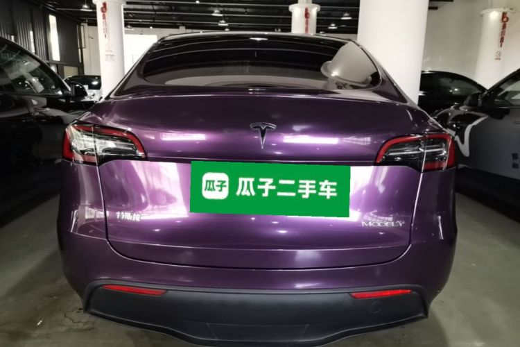 Tesla Model Y 2024 #6 Tesla Model Y 2024 car image #6