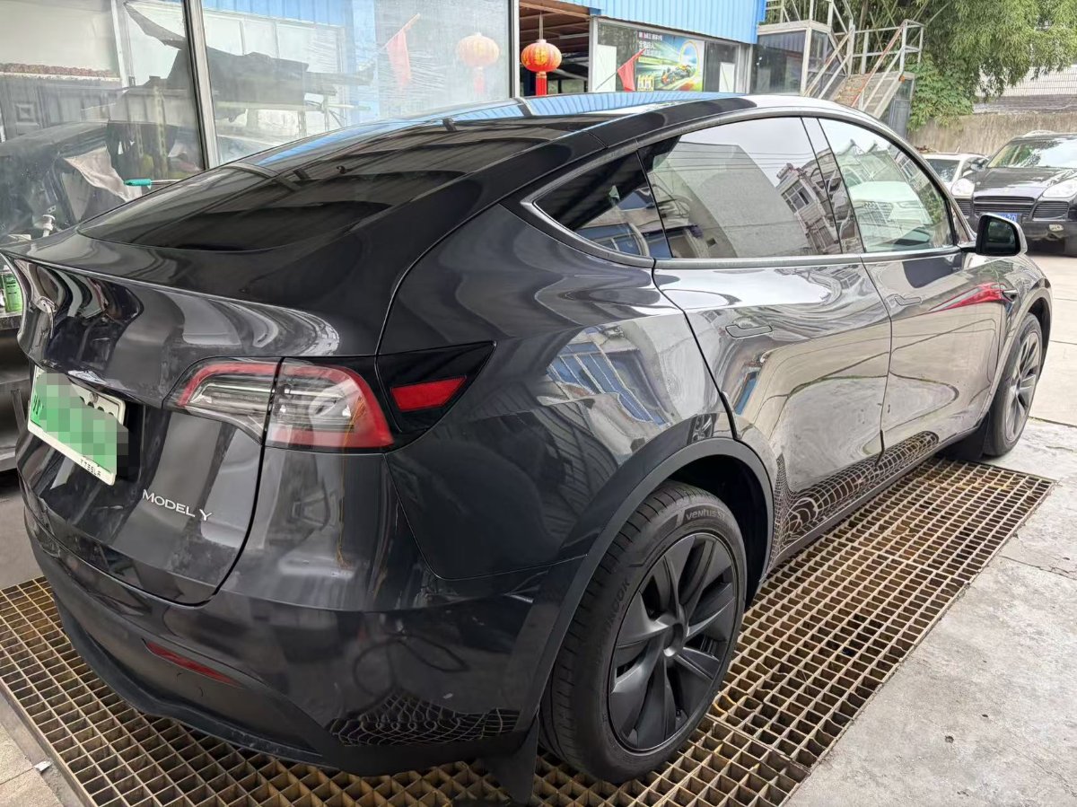 Tesla Model Y 2024 #7 Tesla Model Y 2024 car image #7