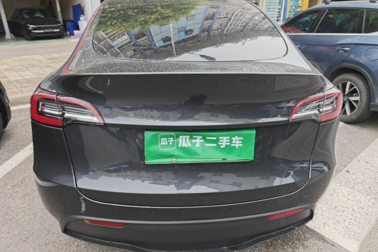 Tesla Model Y 2024 #6 Tesla Model Y 2024 car image #6
