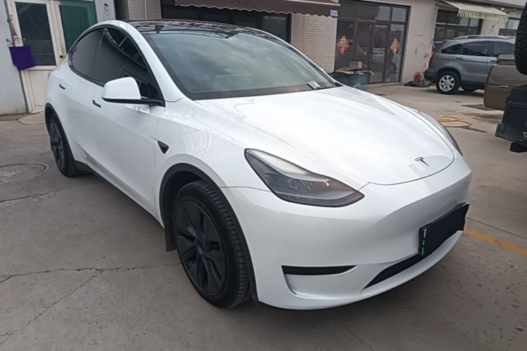 Tesla Model Y 2024 #4 Tesla Model Y 2024 car image #4