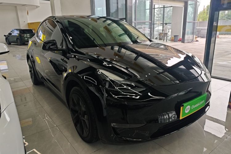 Tesla Model Y 2024 #4 Tesla Model Y 2024 car image #4