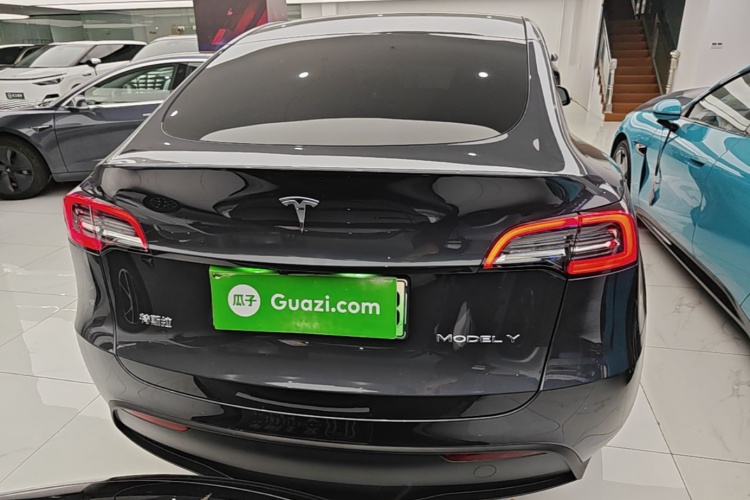 Tesla Model Y 2024 #6 Tesla Model Y 2024 car image #6