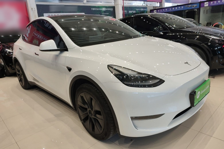 Tesla Model Y 2024 #4 Tesla Model Y 2024 car image #4