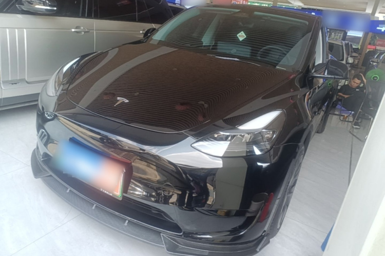 Tesla Model Y 2024 #2 Tesla Model Y 2024 car image #2