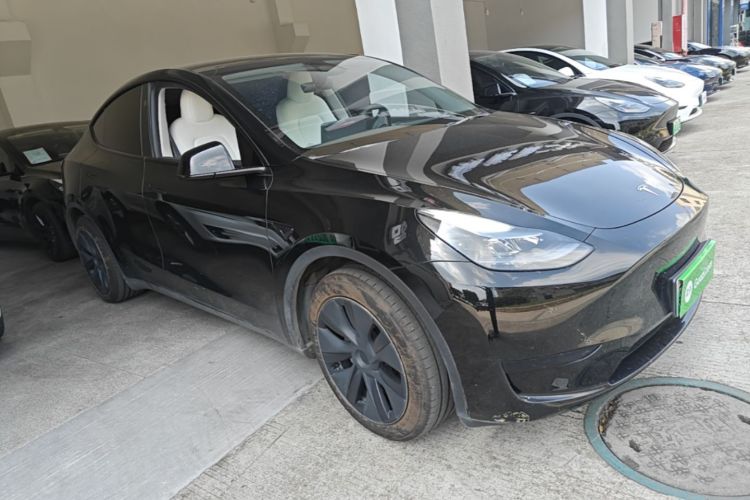 Tesla Model Y 2024 #4 Tesla Model Y 2024 car image #4