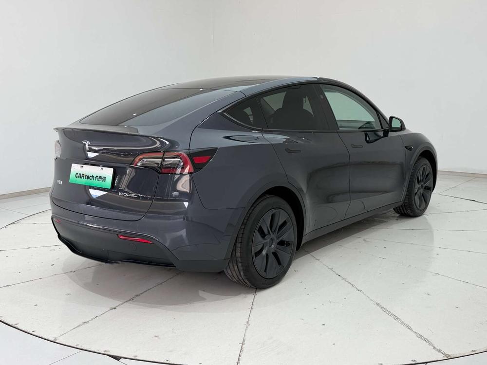Tesla Model Y 2024 #7 Tesla Model Y 2024 car image #7
