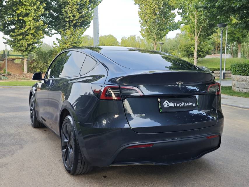 Tesla Model Y 2024 #7 Tesla Model Y 2024 car image #7