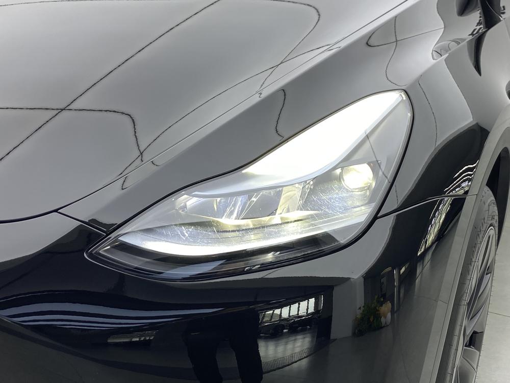 Tesla Model Y 2024 #6 Tesla Model Y 2024 car image #6