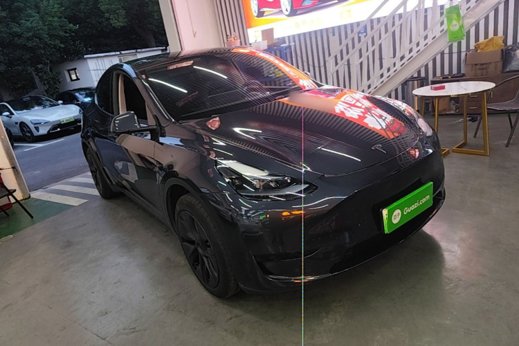 Tesla Model Y 2024 #6 Tesla Model Y 2024 car image #6