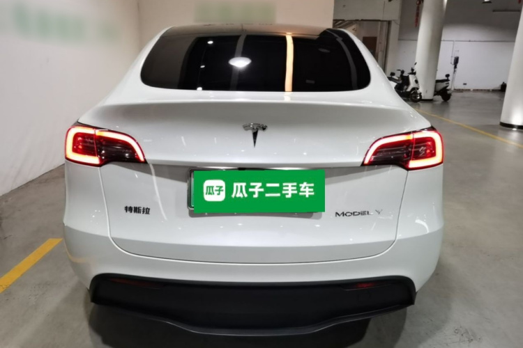 Tesla Model Y 2024 #6 Tesla Model Y 2024 car image #6