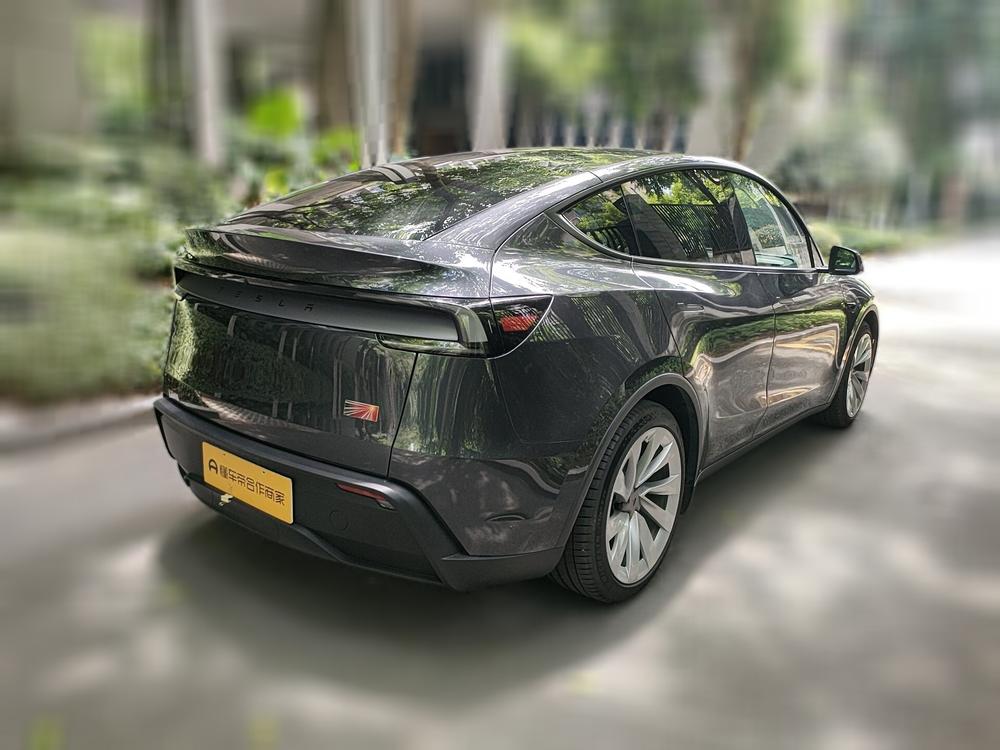 Tesla Model Y 2025 #6 Tesla Model Y 2025 car image #6