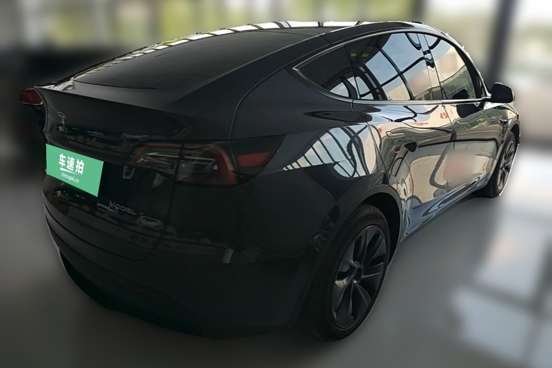 Tesla Model Y 2024 #4 Tesla Model Y 2024 car image #4