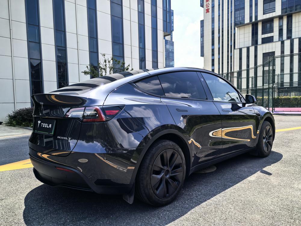 Tesla Model Y 2024 #7 Tesla Model Y 2024 car image #7