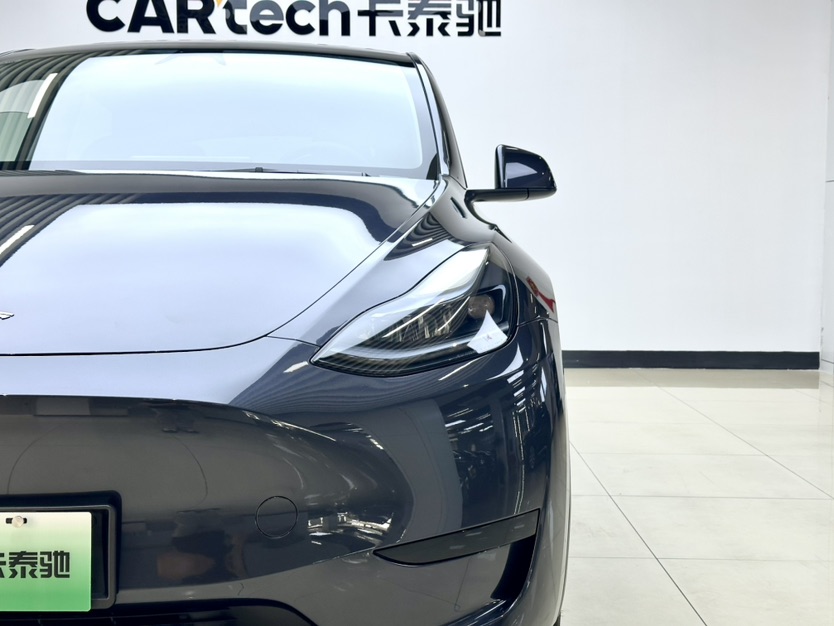 Tesla Model Y 2024 #6 Tesla Model Y 2024 car image #6