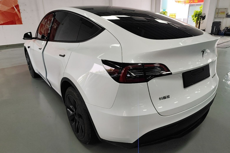 Tesla Model Y 2024 #5 Tesla Model Y 2024 car image #5