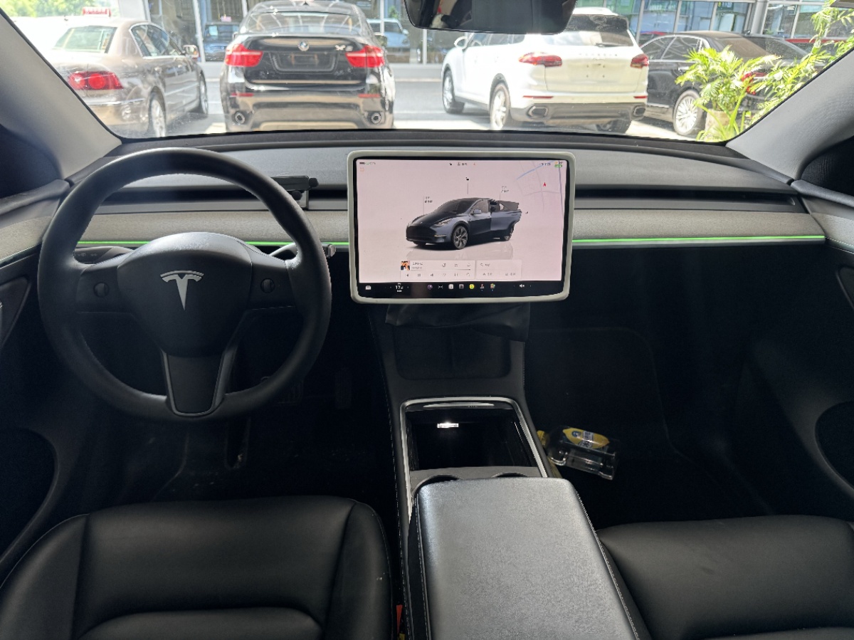 Tesla Model Y 2024 #4 Tesla Model Y 2024 car image #4