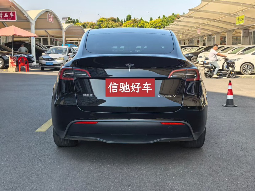 Tesla Model Y 2024 #5 Tesla Model Y 2024 car image #5