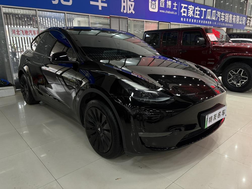 Tesla Model Y 2024 #3 Tesla Model Y 2024 car image #3