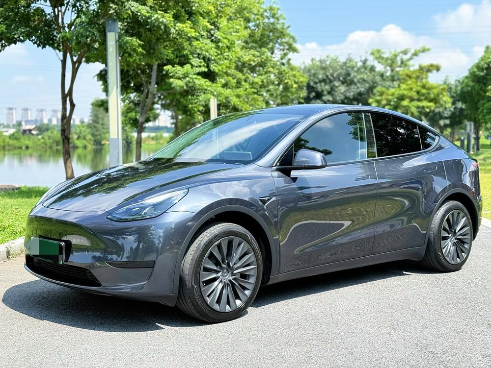 Tesla Model Y 2024 #4 Tesla Model Y 2024 car image #4