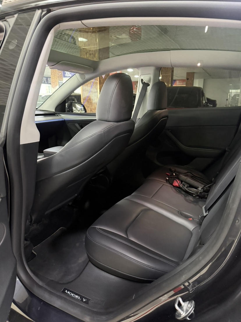 Tesla Model Y 2024 #4 Tesla Model Y 2024 car image #4