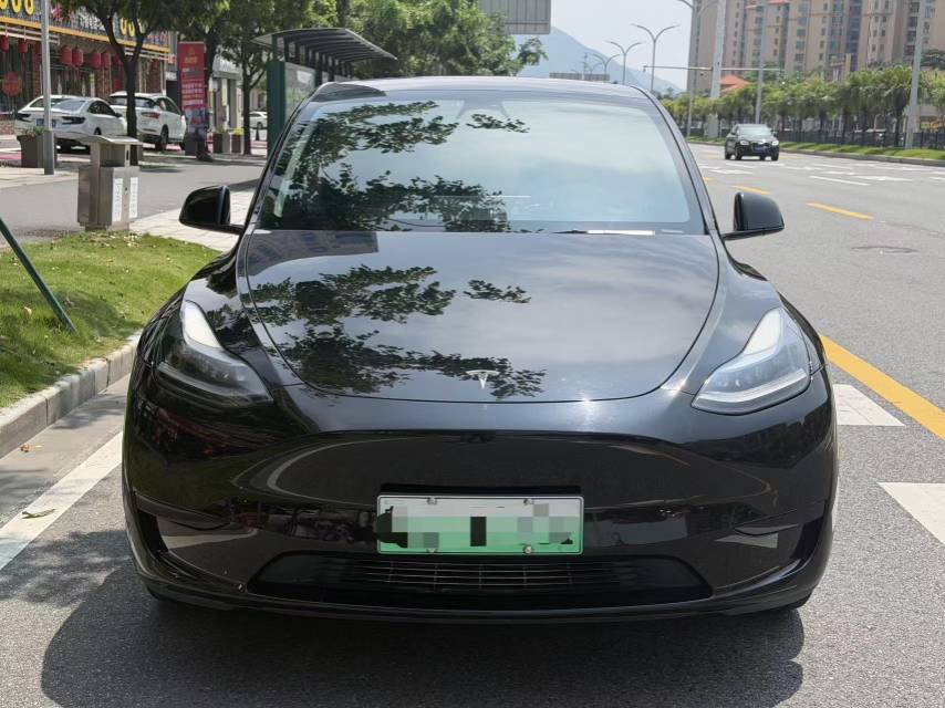 Tesla Model Y 2023 #2 Tesla Model Y 2023 car image #2