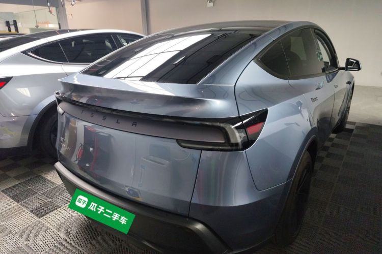 Tesla Model Y 2025 #6 Tesla Model Y 2025 car image #6