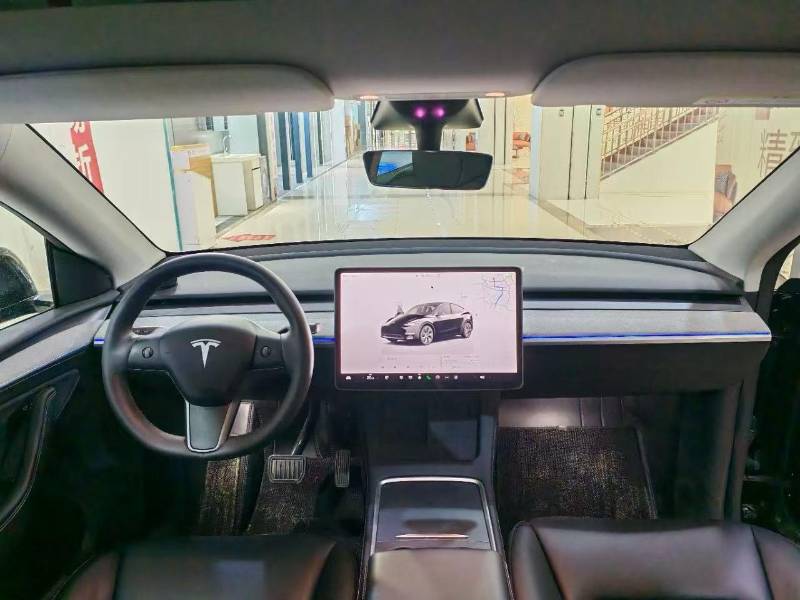 Tesla Model Y 2024 #5 Tesla Model Y 2024 car image #5