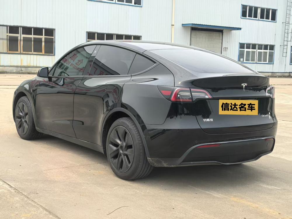 Tesla Model Y 2023 #4 Tesla Model Y 2023 car image #4
