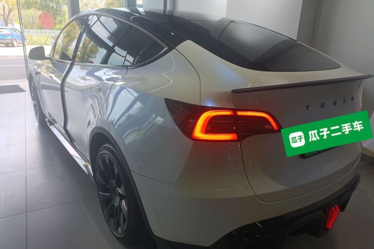 Tesla Model Y 2024 #7 Tesla Model Y 2024 car image #7