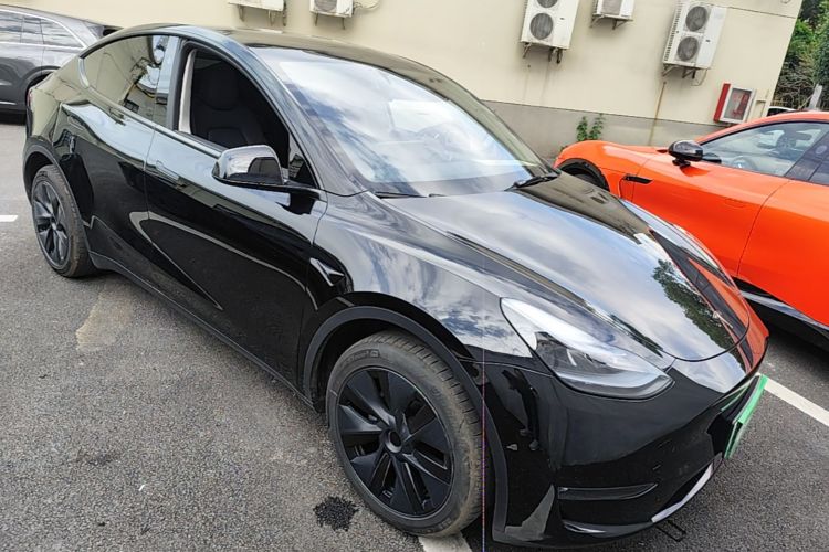 Tesla Model Y 2024 #4 Tesla Model Y 2024 car image #4