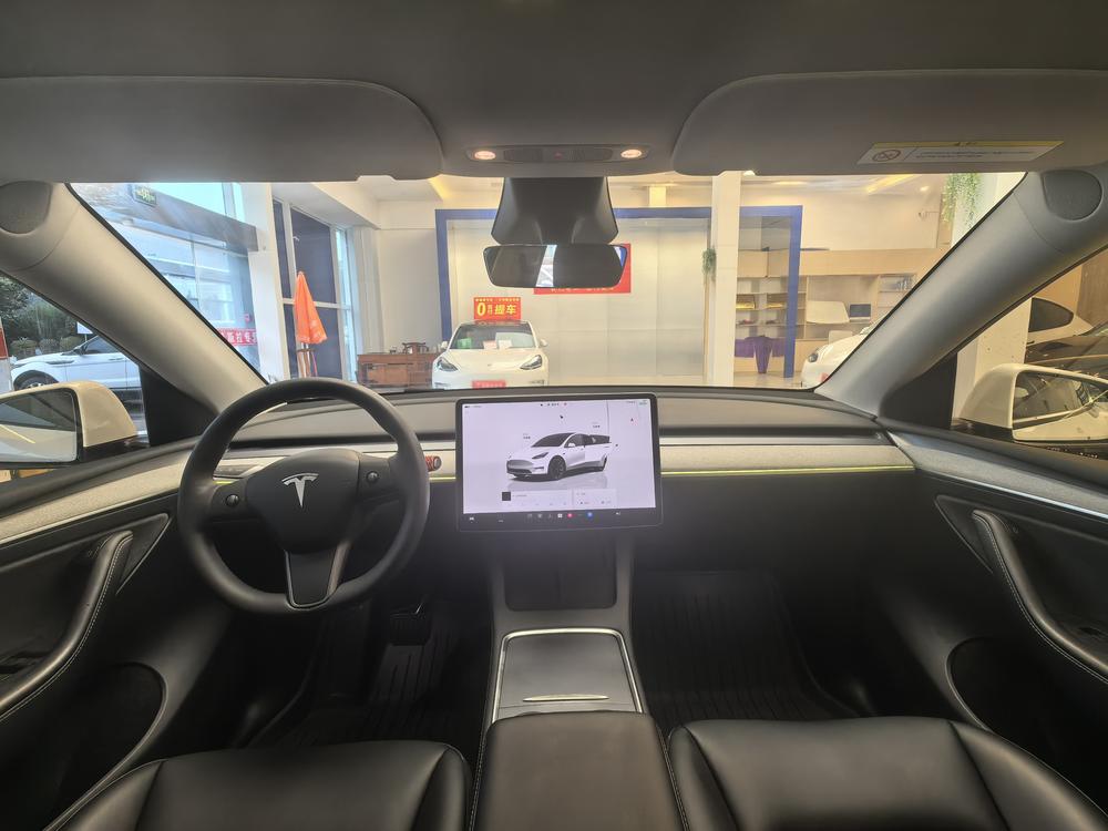 Tesla Model Y 2024 #7 Tesla Model Y 2024 car image #7