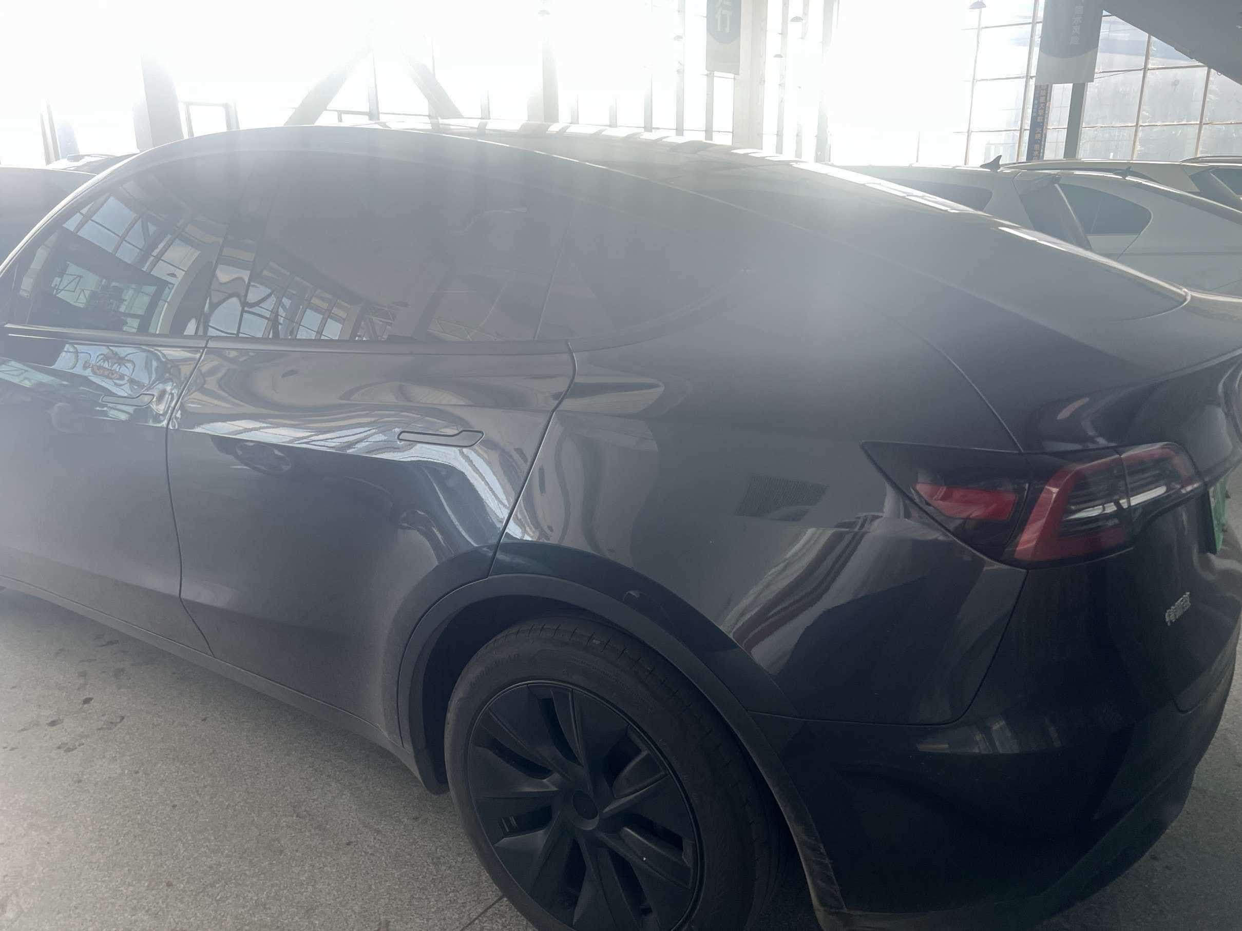Tesla Model Y 2024 #6 Tesla Model Y 2024 car image #6