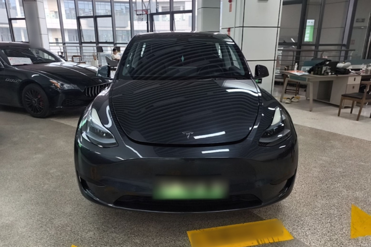 Tesla Model Y 2024 #3 Tesla Model Y 2024 car image #3