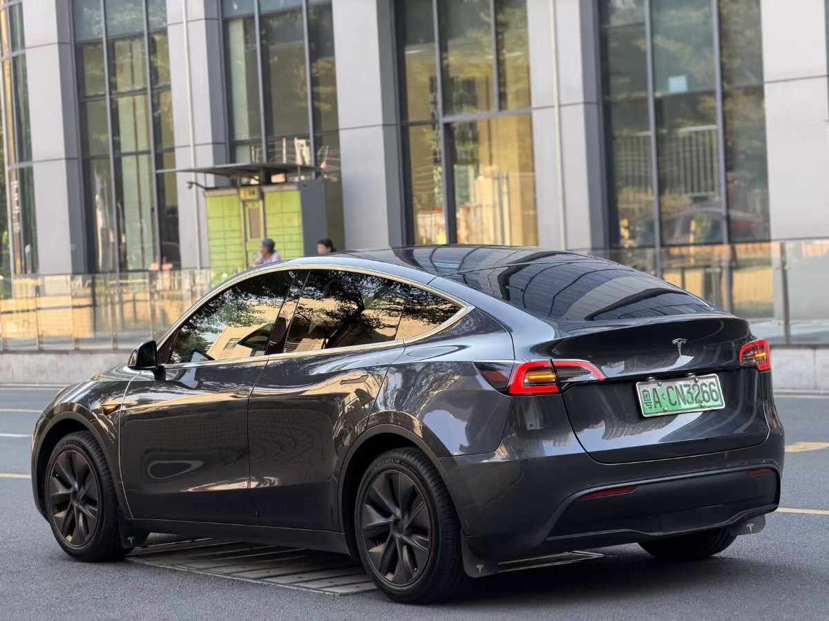 Tesla Model Y 2024 #2 Tesla Model Y 2024 изображение автомобиля #2
