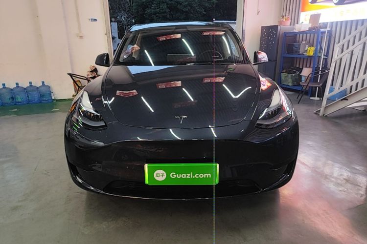 Tesla Model Y 2024 #3 Tesla Model Y 2024 car image #3