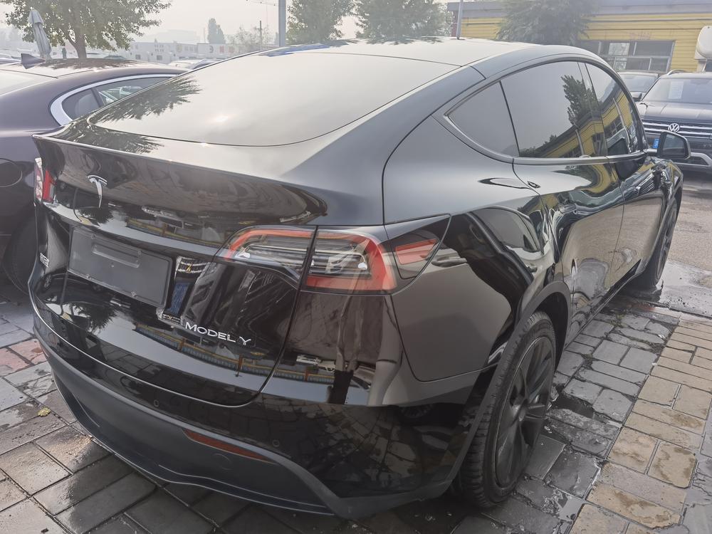 Tesla Model Y 2023 #6 Tesla Model Y 2023 car image #6