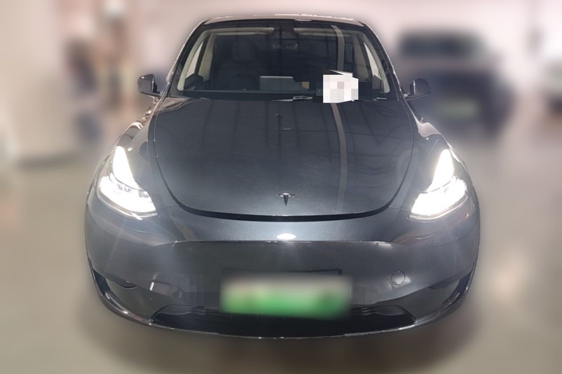 Tesla Model Y 2024 #5 Tesla Model Y 2024 car image #5