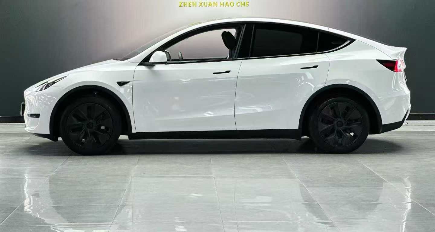 Tesla Model Y 2024 #8 Tesla Model Y 2024 car image #8