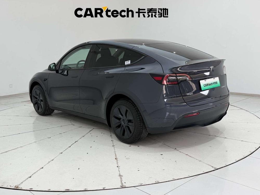 Tesla Model Y 2024 #5 Tesla Model Y 2024 car image #5