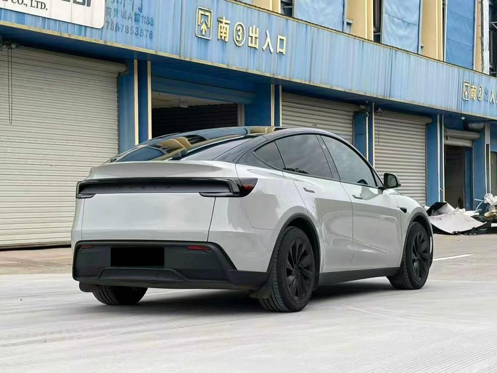 Tesla Model Y 2025 #6 Tesla Model Y 2025 صورة سيارة #6
