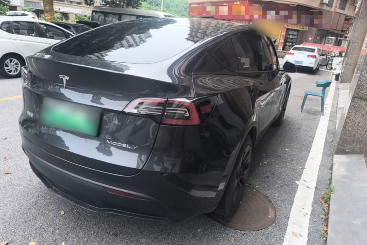 Tesla Model Y 2025 #7 Tesla Model Y 2025 car image #7