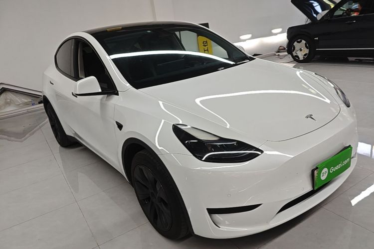 Tesla Model Y 2024 #4 Tesla Model Y 2024 car image #4