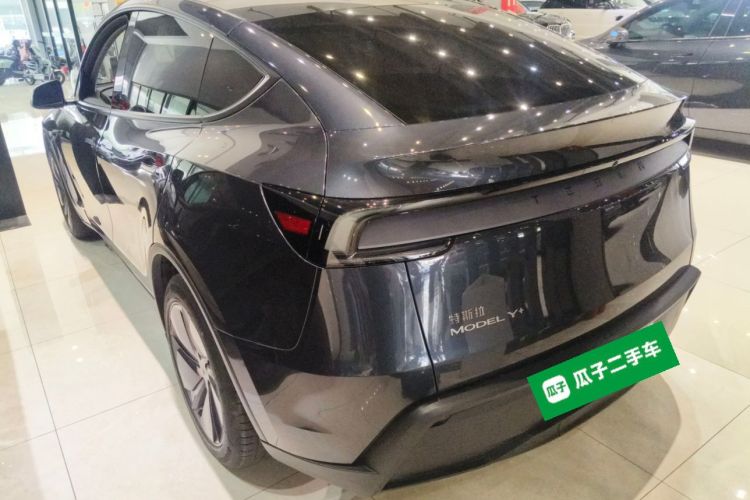 Tesla Model Y 2025 #5 Tesla Model Y 2025 car image #5