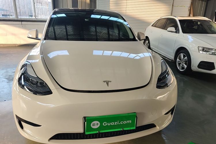 Tesla Model Y 2024 #3 Tesla Model Y 2024 car image #3