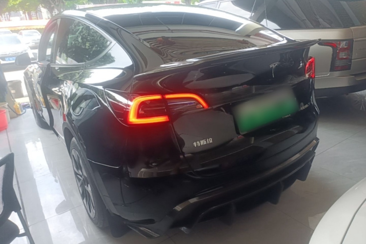 Tesla Model Y 2024 #5 Tesla Model Y 2024 car image #5
