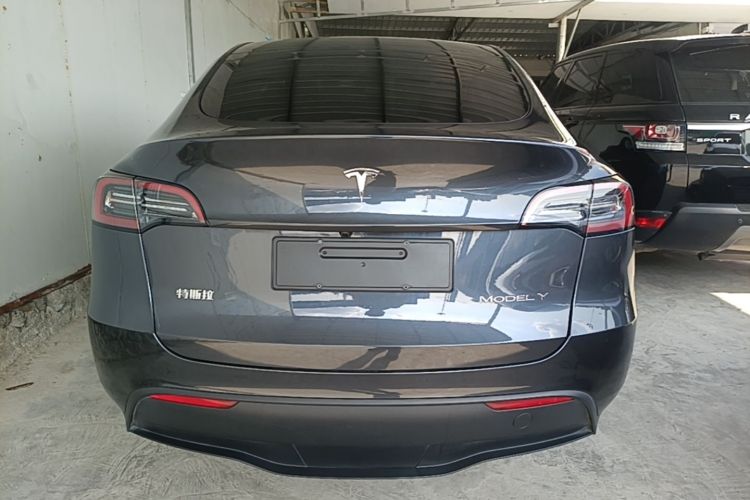 Tesla Model Y 2024 #6 Tesla Model Y 2024 car image #6
