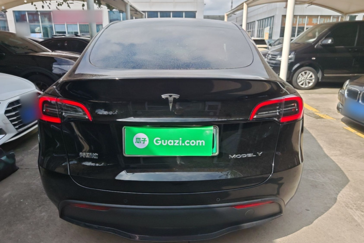 Tesla Model Y 2024 #6 Tesla Model Y 2024 car image #6