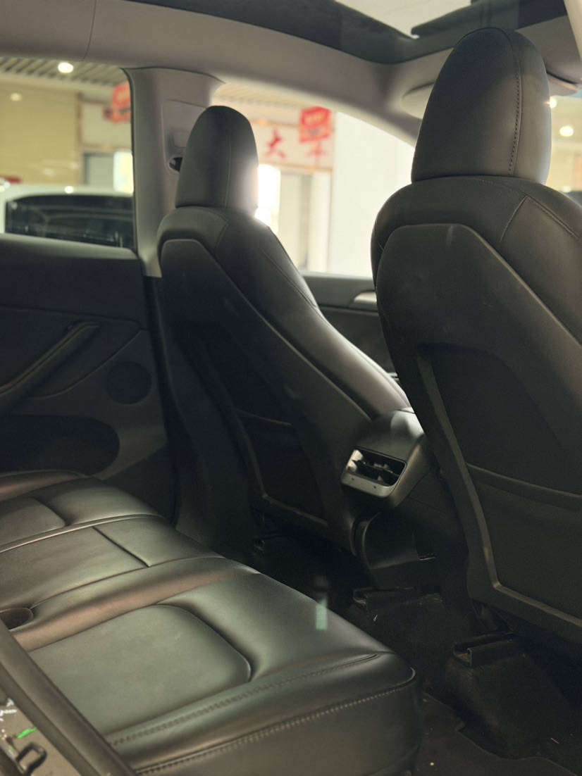 Tesla Model Y 2024 #6 Tesla Model Y 2024 car image #6