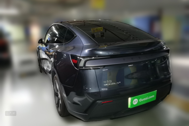 Tesla Model Y 2025 #5 Tesla Model Y 2025 car image #5