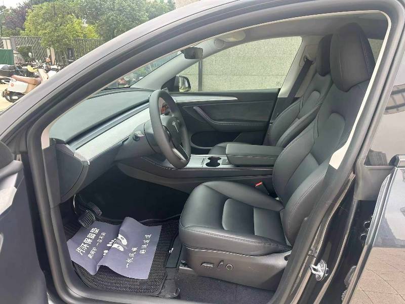Tesla Model Y 2024 #4 Tesla Model Y 2024 car image #4